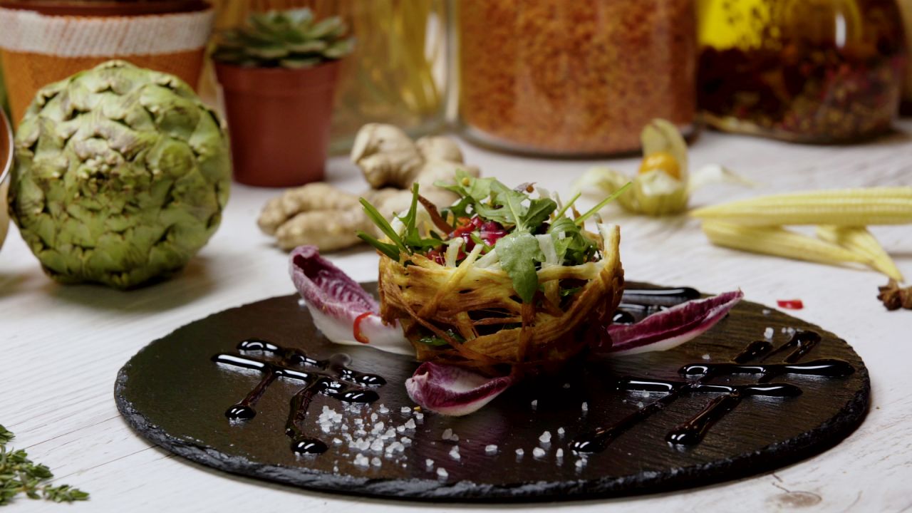 Salad with pastirma in a cheese basket