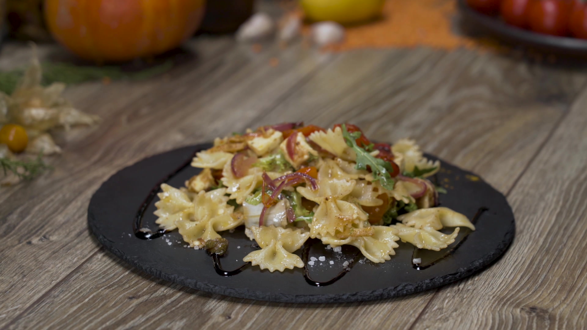 Farfalle with grilled marinated peppers and tofu