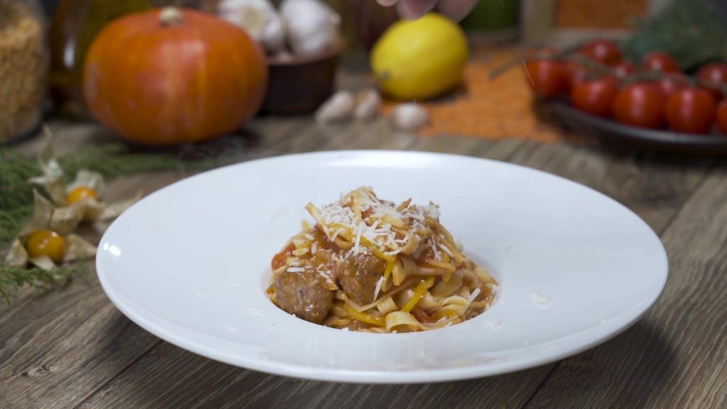 Tagliatelle with tomato sauce and meatballs